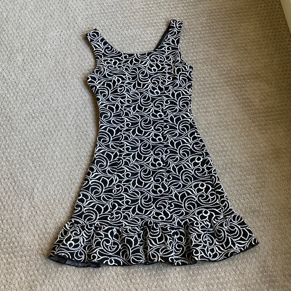 Gently worn xs black/white ruffled hem dress